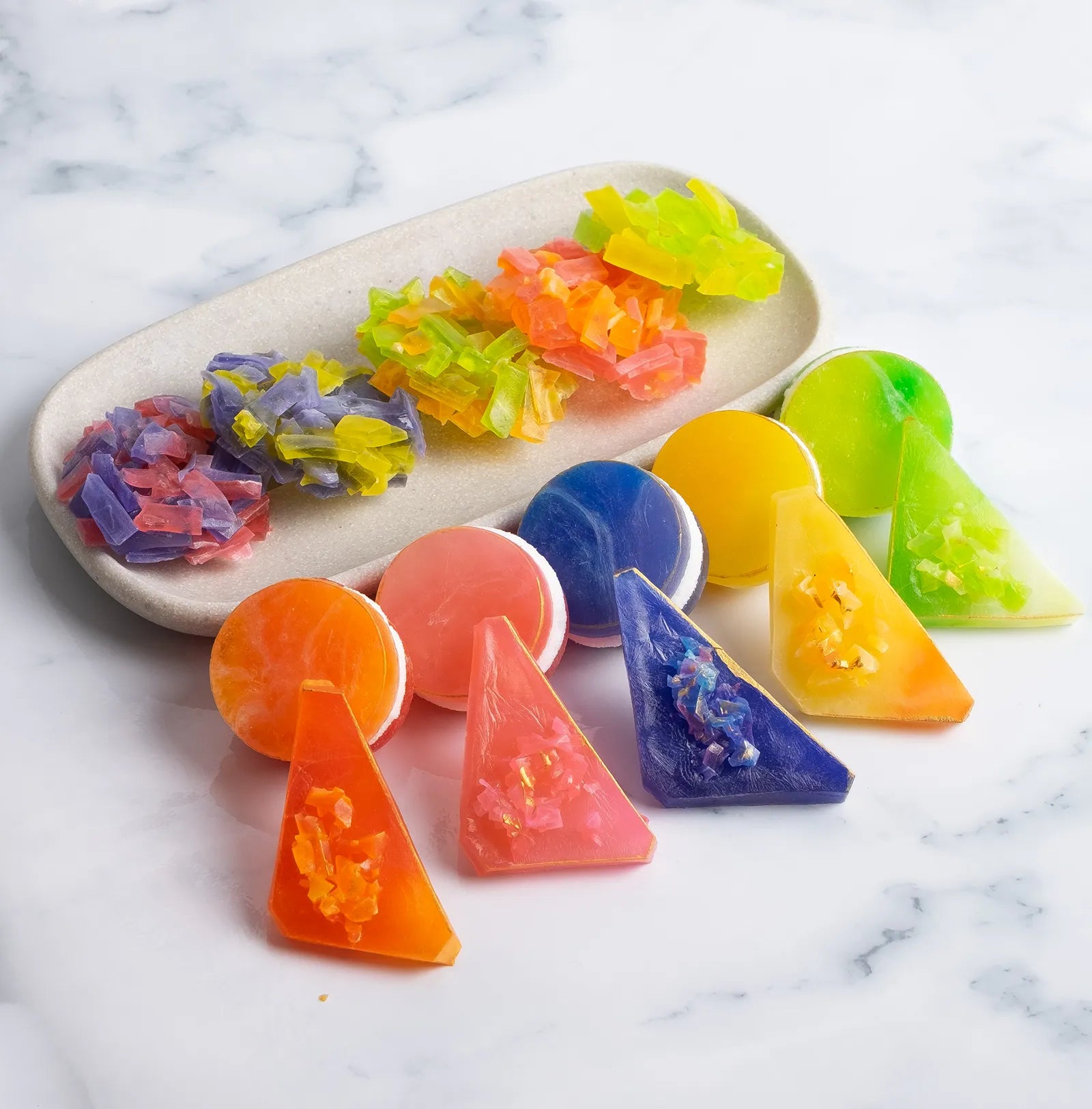 Rectangular platter with colourful crystal  candy clusters behind and a row of round crystal candy with marshmallow and Japanese Crystal Candy.  ASMR crunch ready. 