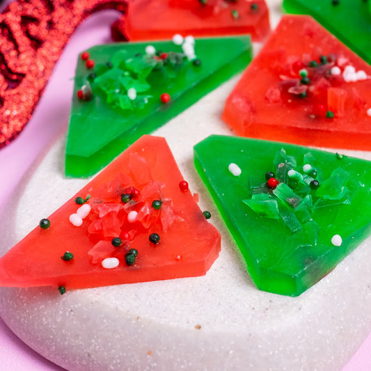 Red and green Japanese style Christmas crystal candy on a white background