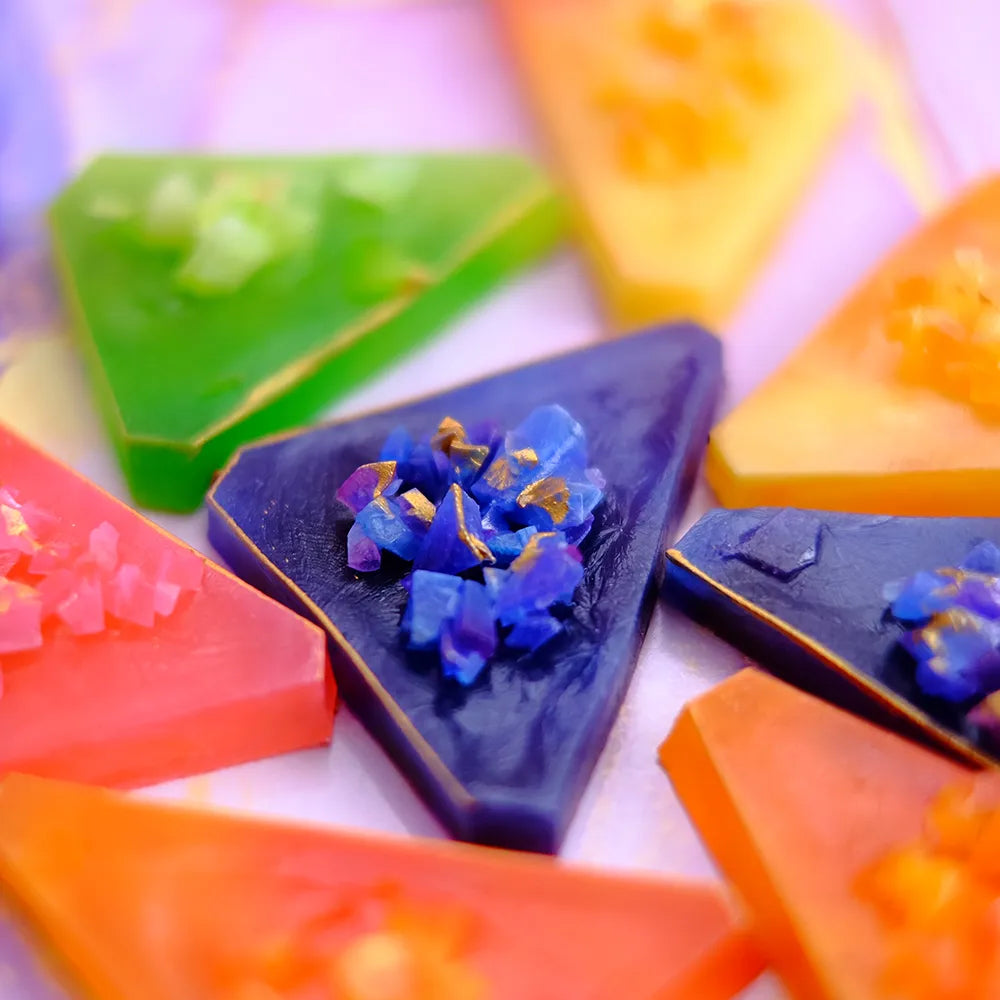 Close-up mixed kohakutou pieces showing crackly shells and jelly centres.